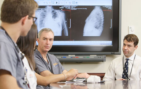 UVA Cardiovascular team consulting over patient images
