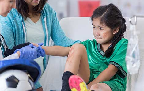 This child's sports injury means she goes to the emergency room for kids at UVA