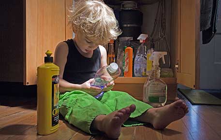 A small child ingesting household poisons - call the poison center 