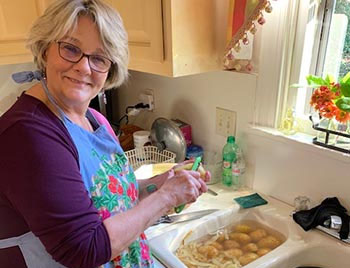 Marcia in her kitchen after melanoma treatment